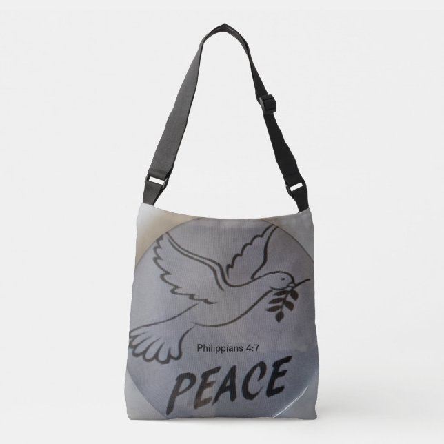 Bolso Cruzado The bag features peace dove and scripture. (Anverso)