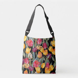 Bolso Cruzado Tulipanes coloridos, fondo negro aislado.