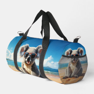 Bolso De Deporte Pequeño Koala en una playa de arena