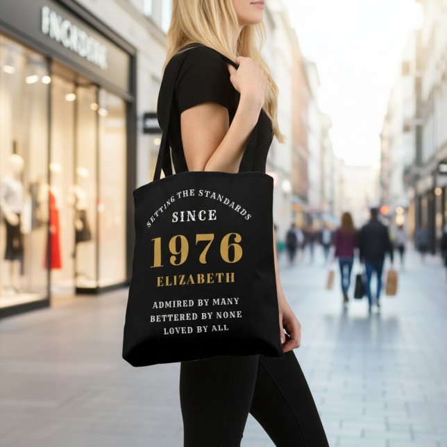 Bolso De Tela 50th Birthday 1976 Black Gold For Her Personalized (Born 1976 birthday tote bag. Background out of focus.)