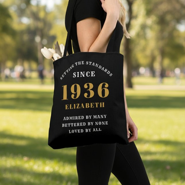 Bolso De Tela 90th Birthday 1936 Black Gold For Her Personalized (Born 1936 birthday tote bag. Background out of focus.)