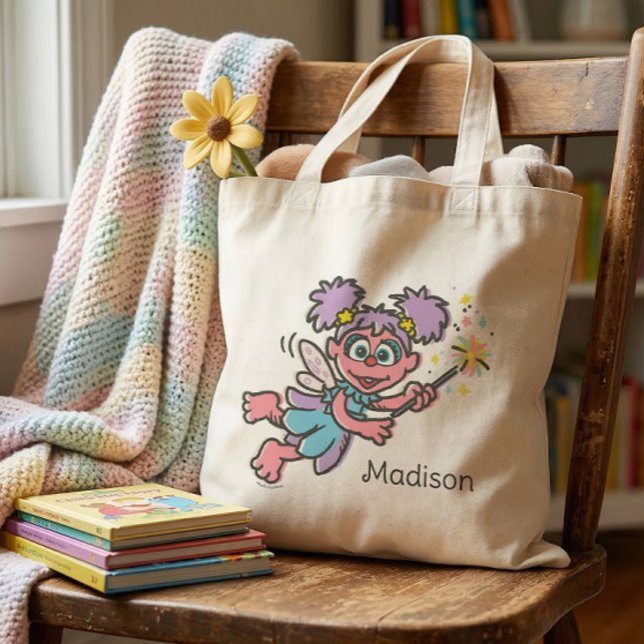 Bolso De Tela Abby Cadabby volando (Generated image of tote bag on chair)