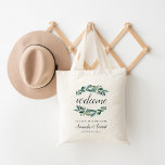 Bolso De Tela Abundant Foliage Boda Bienvenida Tote Bag<br><div class="desc">Bienvenidos a su boda con estos totes botánicos de moda con "bienvenida" en escritura caligráfica rodeados de exuberante vegetación botánica y hojas de eucalipto. "... a nuestro feliz siempre después" aparece debajo junto con sus nombres y fecha de boda.</div>
