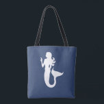 Bolso De Tela adorable tema náutico MERMAID |<br><div class="desc">Este lindo y divertido patrón con un simple dibujo a la sombra de una sirena añade un carácter ecléctico a tu armario. | IMAGEN DE FORMA DE SILHOUETTE SÓLIDO BLANCO DIVERTIDO EN UN FONDO AZUL TROPICAL SÓLIDO | VIDA SIMILAR DEL MAR | OCÉANO | PLAYA | DIVERSIÓN | VERANO |...</div>