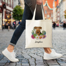 Airedale Terrier con flores coloridas y nombre