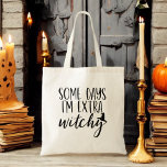 Bolso De Tela Algunos días soy Halloween de mujeres ultraviolent<br><div class="desc">Añade un toque de aspereza a tu estilo con nuestra "Algunos días me pica extra" Bolsa de Tote de Halloween para mujeres modernas. Este tote negro de moda presenta la frase divertida en una tipografía elegante y moderna, perfecta para expresar tu lado brujo. Hecho con materiales duraderos, es lo suficientemente...</div>