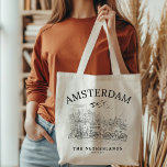 Bolso De Tela Amsterdam Beautiful Vintage Landscape<br><div class="desc">Experience the charm of Amsterdam with our exclusive vintage landscape design, beautifully capturing the essence of this iconic city. Available on stylish t-shirts and cozy sweatshirts, this design is also featured on an array of products including mugs, magnets, keychains, and thermoses. Perfect for travel enthusiasts and lovers of classic European...</div>