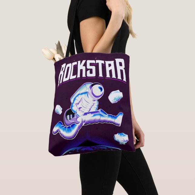 Bolso De Tela Astronauta Rockstar tocando guitarra en el espacio (Detalle)