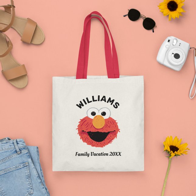 Bolso De Tela Barrio Sésamo | Vacaciones familiares de Elmo (Tote bag on table)