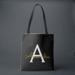 Bolso De Tela Black Name Gold Girly Script Monograma moderno<br><div class="desc">Elegante negro y dorado añade tu propio nombre bolsa de libros monograma. Esta Bolsa de Libros puede ser personalizada para incluir su nombre inicial y de pila y entregarse como regalo para Navidades,  Dulce 16 Cumpleaños,  Ducha de Novias o un Boda.</div>