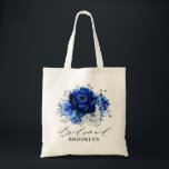 Bolso De Tela Boda floral metálico de plata blanca azul real a<br><div class="desc">Elegante mochila de regalo de la dama de honor de la boda de color blanco azul real con elegante ramo de azul real, marina, plata, flores de rosa de color blanco puro y hojas de eucalipto verde sabio. Comuníquese conmigo para obtener ayuda sobre la personalización o si necesita cualquier otro...</div>