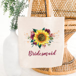 Bolso De Tela Bridesmaid Floral Sunflowers String Lights<br><div class="desc">Esta mochila de tote de la dama de honor cuenta con un girasol acuático y un diseño de rosas de color burdeos con luces de cuerda. Puede personalizarlo con un nombre. Visita nuestra tienda o nuestras páginas de colección para ver más productos con este diseño que puedes personalizar para tus...</div>