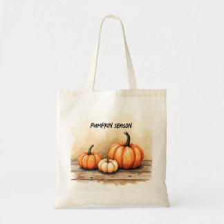 Bolso De Tela Calabazas de Otoño en Mesa de Madera