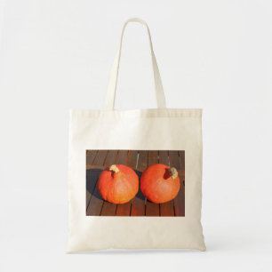 Bolso De Tela Calabazas sobre una mesa de madera