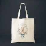 Bolso De Tela Chic Blue Bow Spring Floral Bunny<br><div class="desc">This personalized tote bag features a charming watercolor bunny surrounded by delicate spring florals and finished with a soft blue bow. The gentle pastel palette creates a light, elegant design that feels perfect for Easter celebrations while still being beautiful enough to carry all year long. Add a name to create...</div>