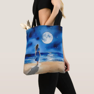 Bolso De Tela Chica en la playa bajo una luna llena