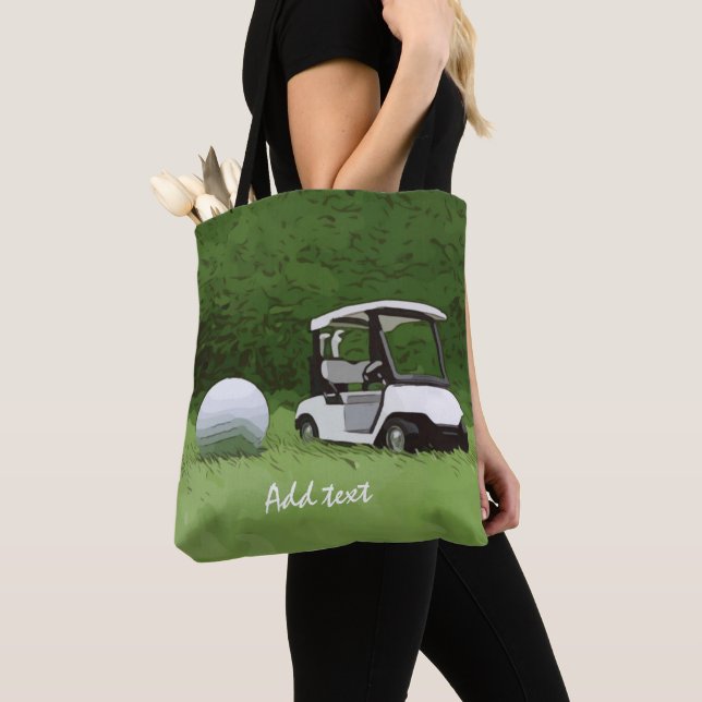 Bolso De Tela Cochecito de golf y pelota de golf sobre césped ve (Detalle)