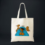 Bolso De Tela Cookie Monster Eating All the Cookies<br><div class="desc">Satisfy your cravings for fun and cookies with this graphic featuring the one and only Cookie Monster! This showcases a vibrant illustration of Cookie Monster in his element, happily devouring a pile of chocolate chip cookies with crumbs flying everywhere. This classic and instantly recognizable design is cheerful, playful, and sure...</div>