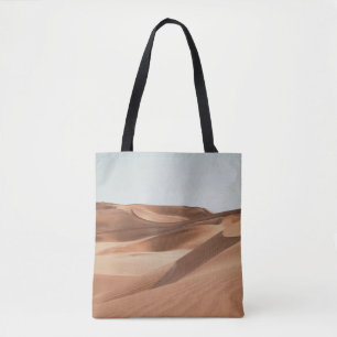 BOLSO DE TELA DESIERTO BAJO CIELO AZUL CLARO DURANTE EL DÍA
