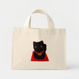 Bolso De Tela Diminuto Maneki Neko negro en una alfombra roja