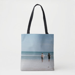 Bolso De Tela Dos personas caminando por la costa