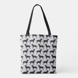 Bolso De Tela El perro negro del labrador retriever siluetea el