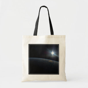 Bolso De Tela El Sol se pone sobre el horizonte de la Tierra.