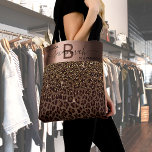Bolso De Tela Fabuloso patrón de leopardo de cumpleaños negro ma<br><div class="desc">Un regalo de cumpleaños 50 (o cualquier edad) elegante, glamuroso y femenino. Con motivos de leopardo marrón, dorado y negro, decorado con confetti dorado. Personalice y agregue su nombre y letra de monograma. Con el texto: 50 & Fabulous (x2) Una falsa banda de color bronce. Letras negras y marrones. El...</div>