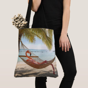Bolso De Tela Flamenco descansando en una hamaca de playa tropic