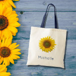 Bolso De Tela Floral de girasol amarillo botánico moderno<br><div class="desc">Bolsa de tetas botánica de girasol moderna con colores amarillo brillante. Con letras azules,  puedes personalizar con tu propio texto. Disfruta de este elegante accesorio que es perfecto para cuando estés en marcha.</div>