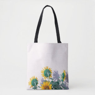 Bolso De Tela Flores azules y amarillas en la pared blanca