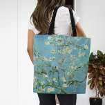 Bolso De Tela Flores de almendra | Vincent Van Gogh<br><div class="desc">Flores de almendra (1890) del artista holandés Vincent van Gogh (1853-1890). La pintura de Van Gogh en Almond Blossoms muestra delicadas flores blancas frente a un vibrante cielo turquesa, simbolizando la nueva vida y renovación. Inspiradas por el arte japonés, las elegantes ramas y las líneas fluidas crean una sensación de...</div>