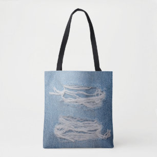 Bolso De Tela Fondo de textura de vaqueros de denim azul rotos. 