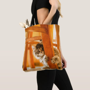 Bolso De Tela Gatito debajo de la silla
