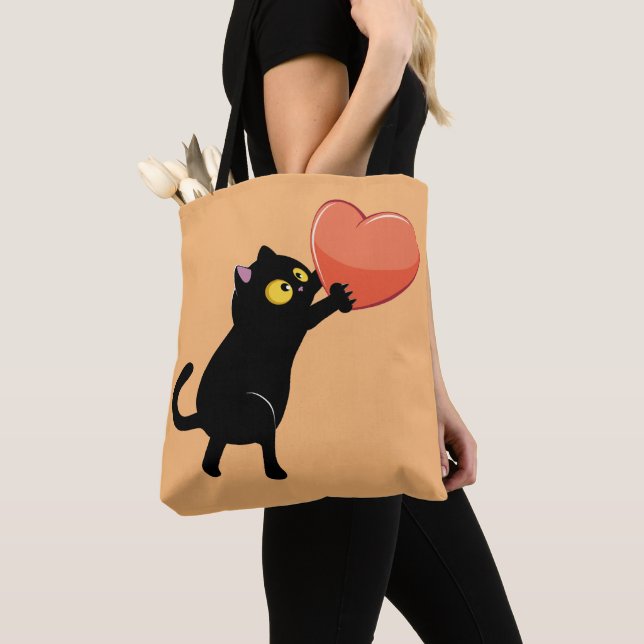 Bolso De Tela Gato negro sosteniendo el corazón (Detalle)