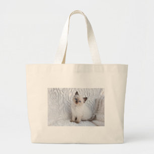 Bolso De Tela Gigante Un gato joven del ragdoll que se sienta en la piel