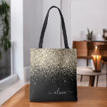 Bolso De Tela Gold Black Girly Purpurina Sparkle Monograma Nombr<br><div class="desc">Bolsa de libros monograma elegante de color negro y oro. Esta Bolsa de Libros puede ser personalizada para incluir su nombre inicial y de pila y entregarse como regalo para Navidades,  Dulce 16 Cumpleaños,  Ducha de Novias o un Boda.</div>