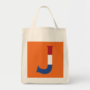 Bolso De Tela J Monograma colocado sobre la bandera de la LND en