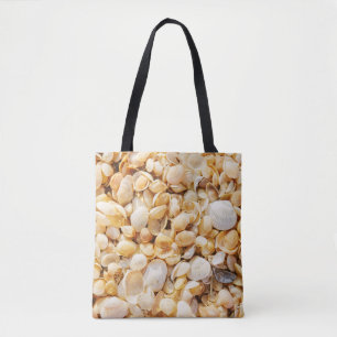 Bolso De Tela La concha texturaba el fondo de la playa de verano