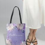 Bolso De Tela Lavender Floral Spring Wedding Bridesmaids Regalo<br><div class="desc">Los diseños florales de acuarela se han vuelto cada vez más populares en el mundo de los bodas. Este diseño presenta trazos suaves y delicados de acuarela de color blanco y lavanda que evocan un sentimiento de romanticismo y elegancia. La combinación de colores pastel y vivos le da a esta...</div>