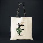 Bolso De Tela Letra F Monograma | Monstera Tropical Personalizad<br><div class="desc">Letra personalizable F monograma bolsa de tote con hoja de montera acuarela, hojas de Relieve metalizado de oro falsas y acentos de pincel de acuarela negra. Personalice este bolso de tote de monograma tropical añadiendo su nombre u otros detalles. Esta letra de boho F monogramada en la bolsa de tocador...</div>