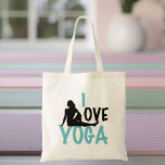 Bolso De Tela Me encanta el yoga<br><div class="desc">Un regalo de yoga lindo con yoga escrito en un hermoso color verde azulado y una mujer estirada en una posición de giro de bonito en el estudio. Profesor de yoga de Guay presente.</div>
