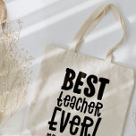 Bolso De Tela Mejor profesor, gracias profesor moderno<br><div class="desc">El mejor profesor te da las gracias por el moderno y elegante regalo de tipografía. Con letras a mano diversión moderna gracias por ayudarme a brillar la escritura y el diseño del sol de bonito, y espacio para el nombre del profesor. El fin de año perfecto, Navidades o regalo de...</div>