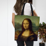 Bolso De Tela Mona Lisa | Leonardo da Vinci<br><div class="desc">Mona Lisa (1503-1506) del artista renacentista italiano Leonardo da Vinci. El trabajo original es aceite en paneles de madera de álamo. Se cree que esta famosa pintura es un retrato de Lisa Gherardini, y ha sido aclamada como "la más conocida, la más visitada, la más escrita, la más cantada, la...</div>