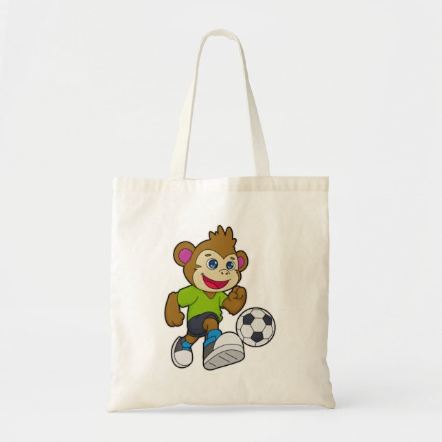 Bolso De Tela Mono como jugador de fútbol con fútbol (Frente)