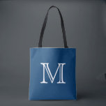 Bolso De Tela Monograma blanco azul náutico<br><div class="desc">¡Este tote está seguro de sentir bien a un favorito! Diseñado en un tono hermoso del azul náutico, la esta bolsa de asas se puede modificar para requisitos particulares con un monograma o una inicial de su opción. Hace un gran tote para la playa, vacaciones, viaje, libros, artes, o para...</div>