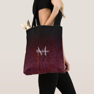 Bolso De Tela Monograma de Patina Metalizado de color negro rojo