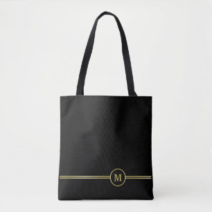 Bolso De Tela Monograma dorado elegante sobre negro