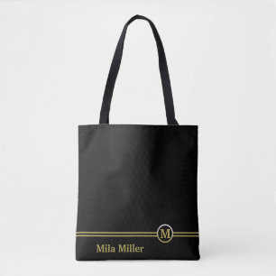 Bolso De Tela Monograma dorado sobre fondo negro