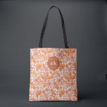 Bolso De Tela Monograma Groovy Retro Naranja Florals<br><div class="desc">El Groovy Retro Naranja Florals Monogram Tote Bag es un accesorio elegante y funcional perfecto para cualquier ocasión. Con su audaz estampado floral naranja y su monograma personalizado, este tote añade un vibrante pop de color a su armario. Esta bolsa es lo suficientemente espaciosa para llevar todo lo necesario, tanto...</div>